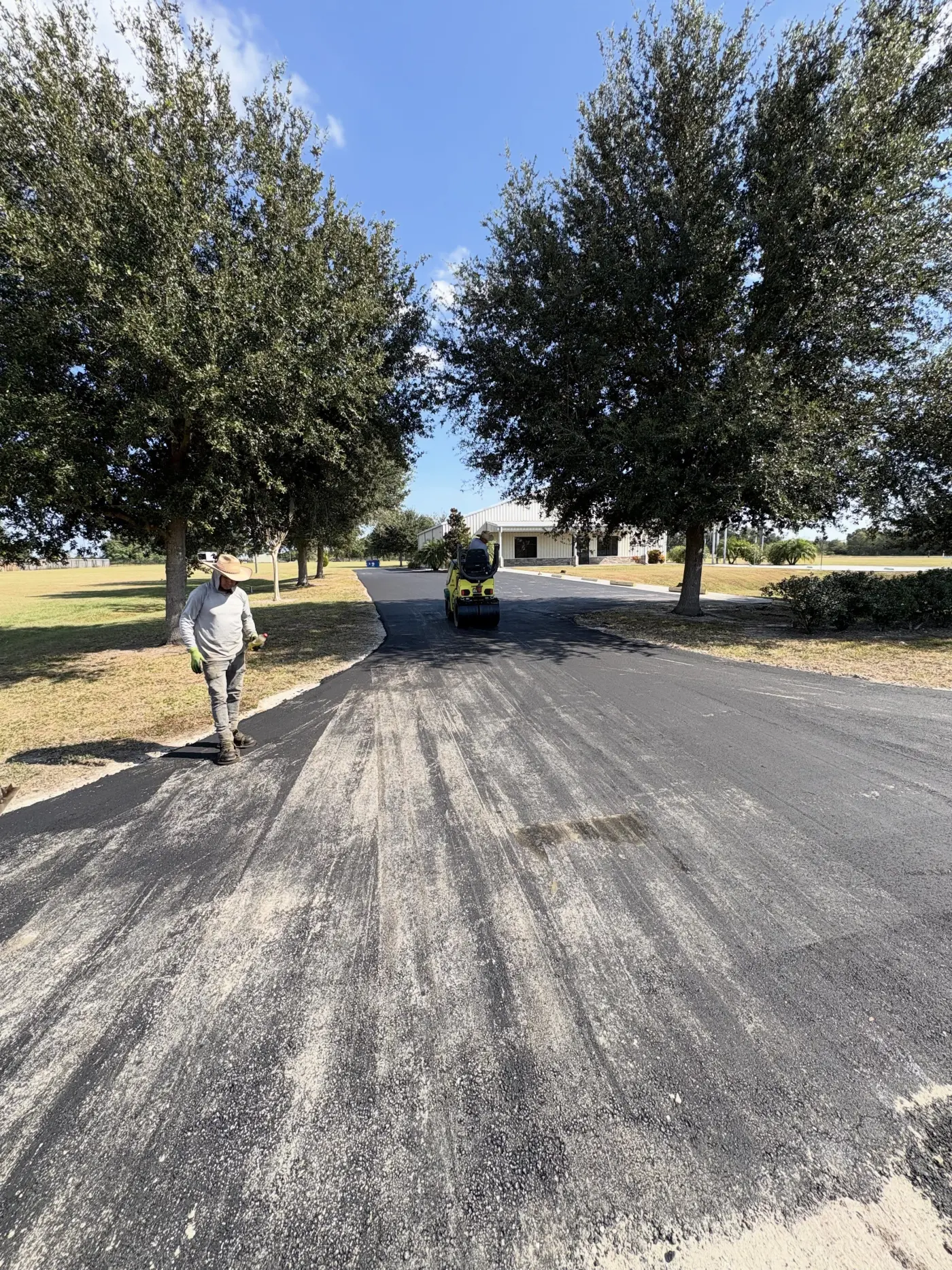 Freshly finished residential asphalt driveway